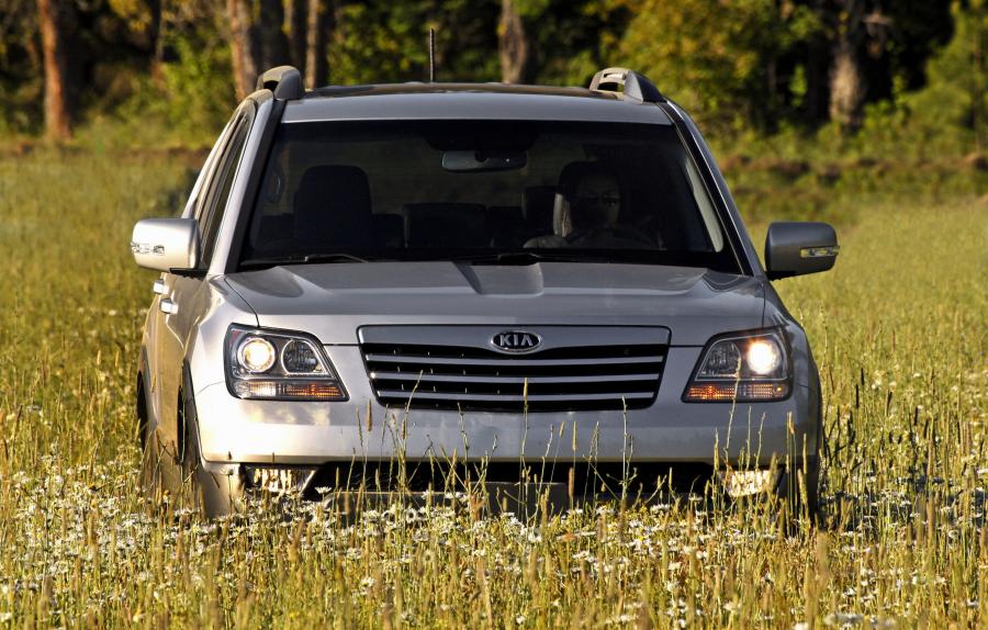 Kia Borrego 2009 года  (фото 231 из 345)